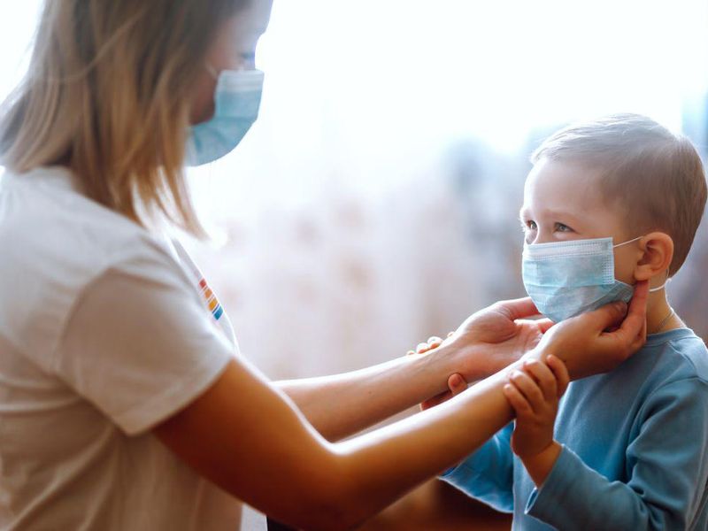 Keep Wearing Masks a While Longer, CDC Director Says