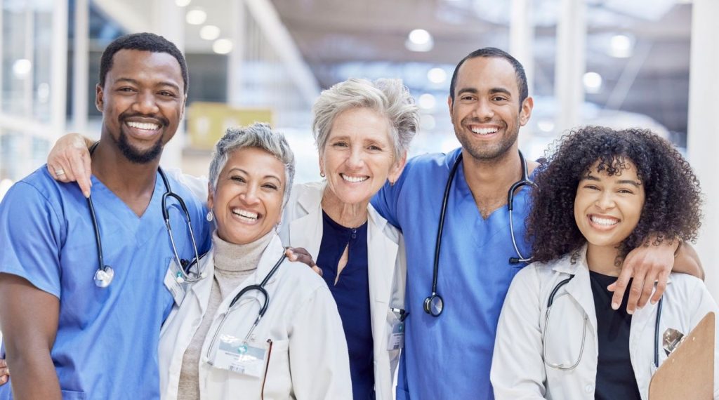 Happy group of multiracial doctors, teamwork, ethnicities, ethnic, races, diversity. photo
