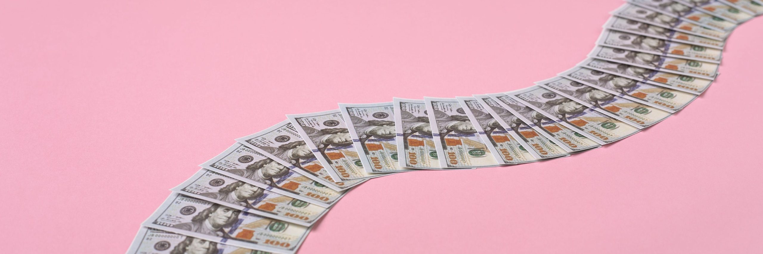 Money path made of 100 dollar bills on pink background. Concept of financial road. , collections