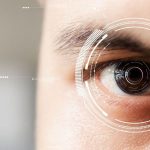 Eye examination and treatment, biometric scanning of close-up male eye