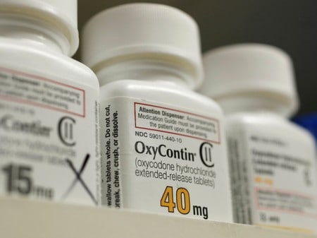 OxyContin maker Purdue gets brief shield from litigation