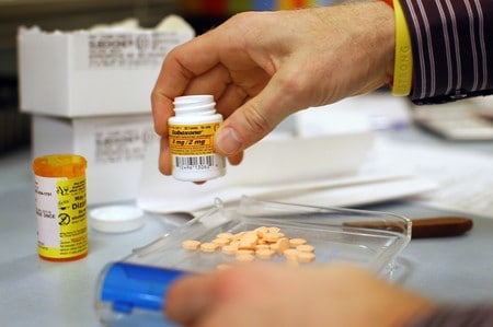 Indivior shares plummet, Reckitt hurt on U.S. charges over opioid prescriptions