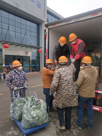 In China’s coronavirus epicenter, volunteers keep stricken city moving