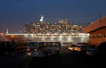 Virus spreads on cruise ship in Japan, U.S. passengers flying home