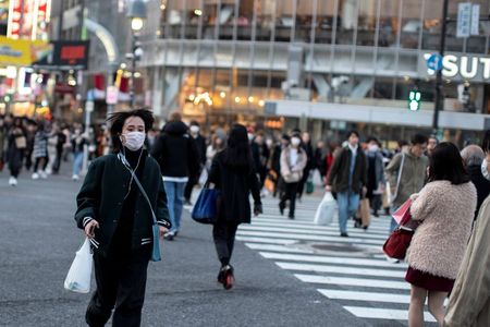 Rise in coronavirus infections prompts Japan to limit public crowds