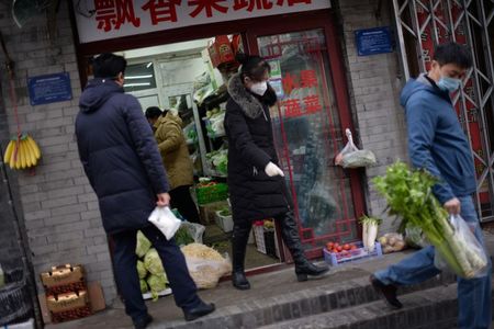 Coronavirus cases in China’s Hubei fall for second day, Apple and markets feel impact