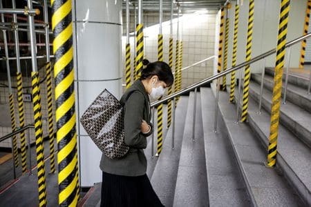 ‘Like a zombie apocalypse’: Residents on edge as coronavirus cases surge in South Korea