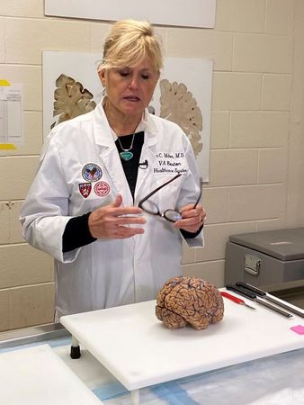 In brains of dead athletes, researchers seek clues to head trauma