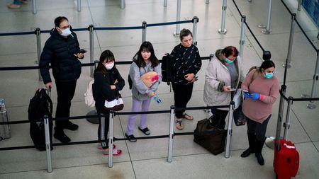 To limit coronavirus exposure, U.S. airport security screeners push for better masks