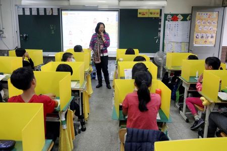 Taiwan school uses dividers during lunch to counter coronavirus