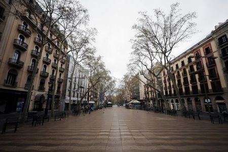 Deserted streets, talking drones as Spain imposes state of emergency over virus