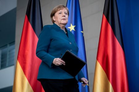 Germany’s Merkel goes into quarantine after contact with infected doctor