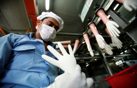 Worker crunch hits world’s top medical glove maker as demand spikes