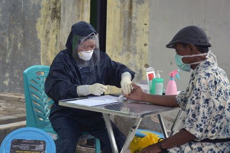 Indonesia provinces blame reagents, labs for stalling COVID-19 testing