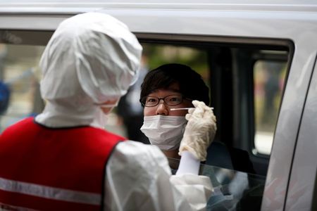 As Japan reopens, coronavirus testing slowed by bureaucracy and staff shortages