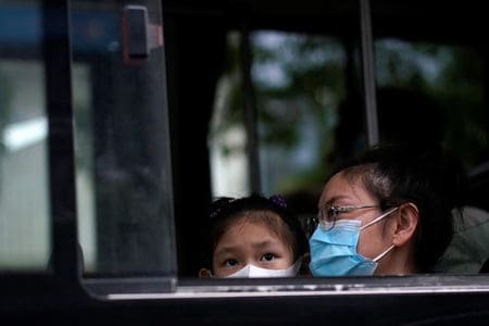 China reports 16 new COVID-19 cases, highest in nearly three weeks