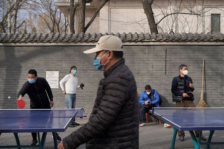 New coronavirus cases fall in China, but WHO concerned by global spread