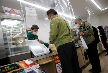 With plastic sheets, Japan’s convenience stores target social distancing