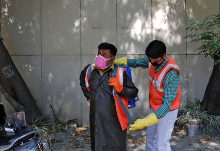 ‘I do feel afraid’: Indian workers disinfect coronavirus hotspots