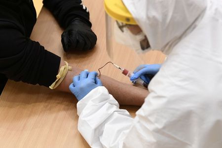 Italy picks U.S. firm Abbott Laboratories to supply coronavirus blood tests