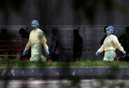 Singapore confirms 799 new coronavirus cases